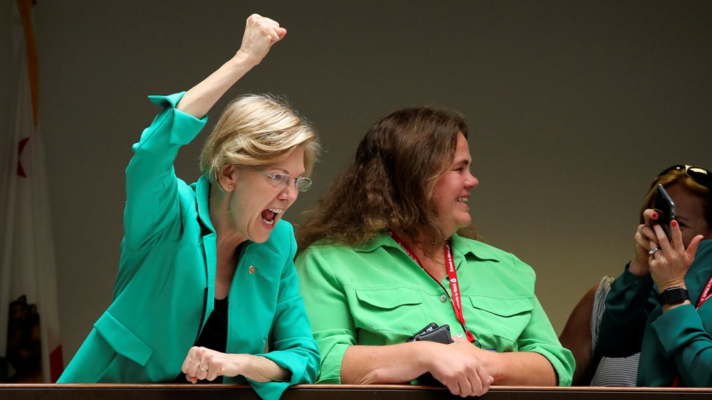 Warren raising fist