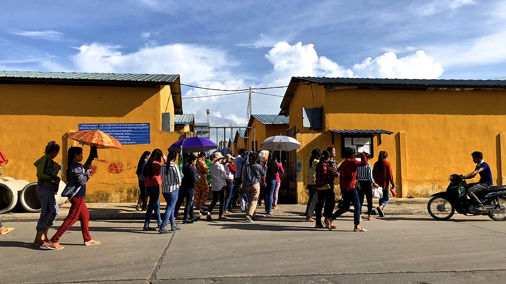 Garment workers leaving factory in Phnon Pheh, Cambodia
