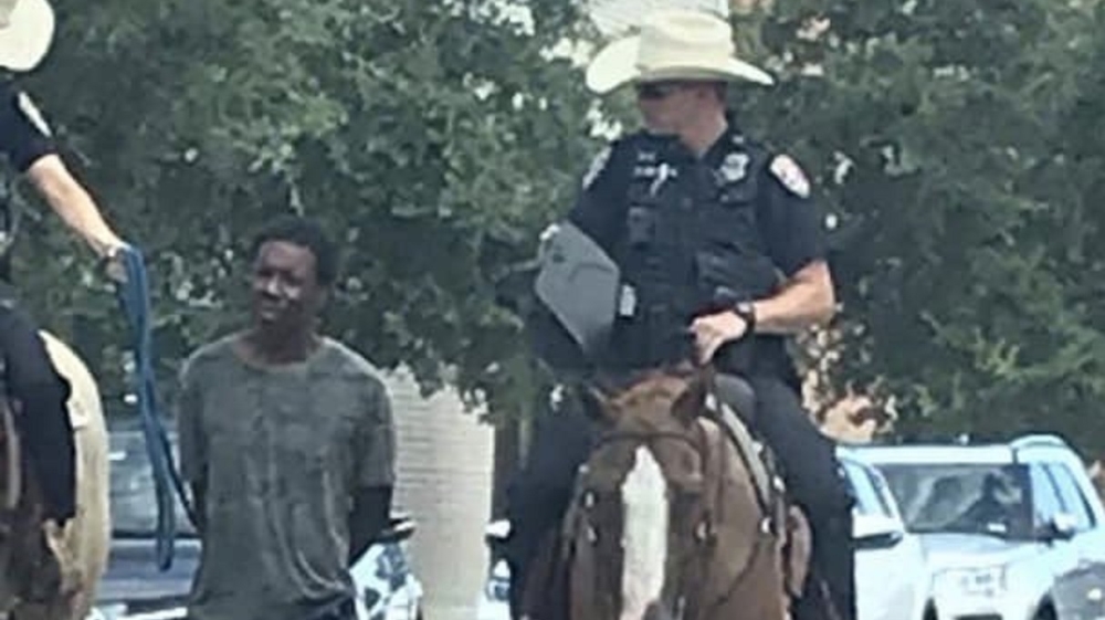 Outrage in US as photo shows police leading black man by a rope