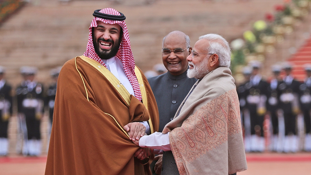FILE - In this Feb. 20, 2019 file photo, Saudi Arabia's Crown Prince Mohammed bin Salman shakes hand with Indian Prime Minister Narendra Modi during a ceremonial welcome in New Delhi, India. Amid the