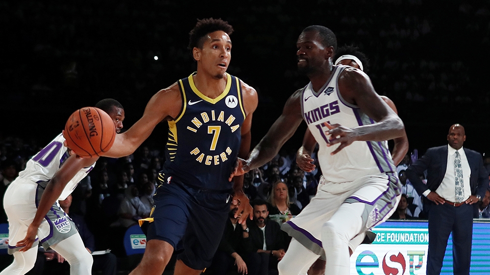 Basketball - NBA Preseason Friendly - Indiana Pacers v Sacramento Kings - NSCI Dome, Mumbai, India - October 4, 2019  Indiana Pacers' Malcolm Brogdon in action with Sacramento Kings' Dewayne Dedmon  R