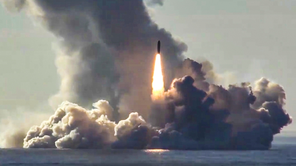 In this photo made from the footage taken from Russian Defense Ministry official web site on Thursday, May 24, 2018, the Russian nuclear submarine Yuri Dolgoruky test-fires the Bulava missiles from th