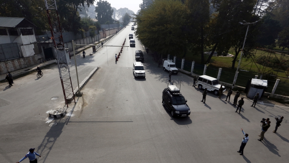 A convoy of vehicles carrying European Union lawmakers is seen after they arrived in Srinagar