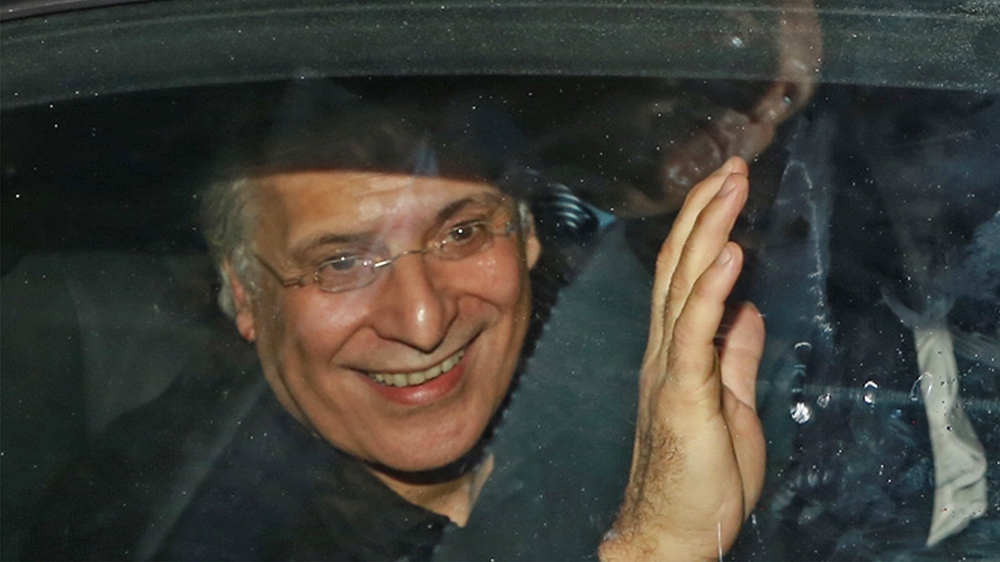 Tunisia''s presidential candidate Nabil Karoui waves at his supporters after being released from Mornaguia prison near the capital Tunis on October 9, 2019, ahead of Sunday''s runoff. - The announcement