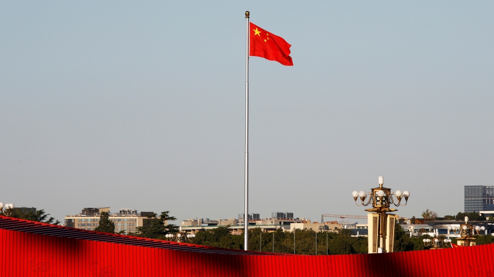 Chinese flag flutters at the Tiananmen Square in Beijing
