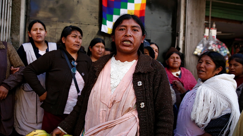 A vendor of bananas protests against interim Bolivia''s President Jeanine Anez at a street market in La Paz, Bolivia, November 17, 2019. REUTERS/David Mercado