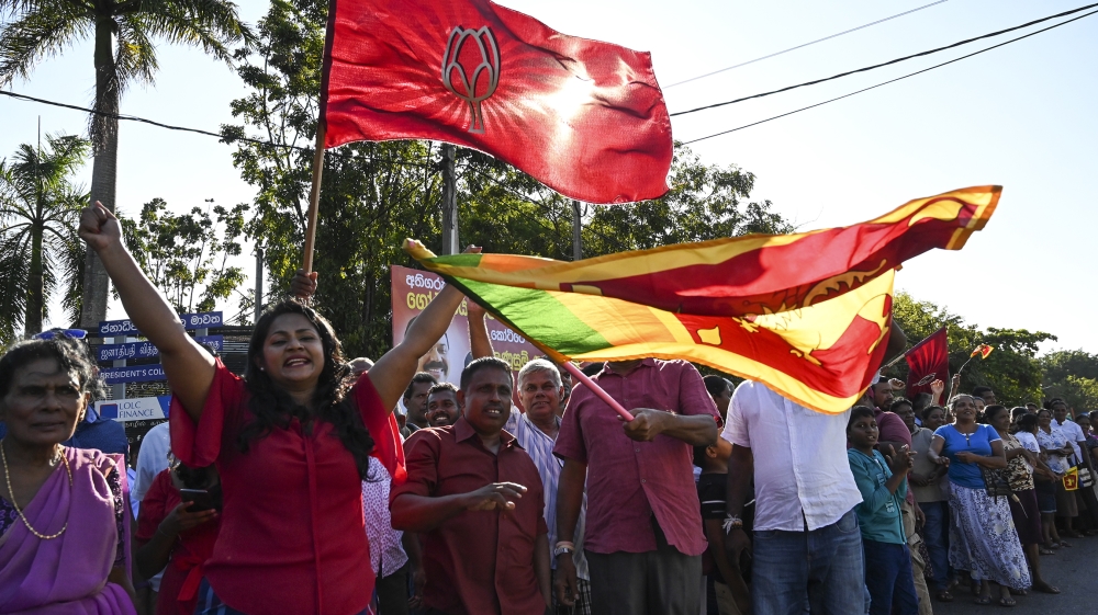 Supporters of Sri Lanka''s President-elect Gotabaya Rajapaksa cheer near the election commission office in Colombo on November 17, 2019. Gotabaya Rajapaksa, who spearheaded the brutal crushing of the T