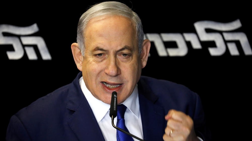 Israeli Prime Minister Benjamin Netanyahu addresses the media in Airport City near Tel Aviv