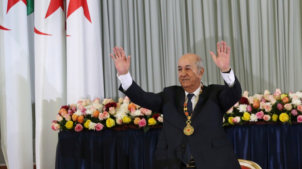 Newly elected Algerian President Abdelmadjid Tebboune gestures during a swearing-in ceremony in Algiers