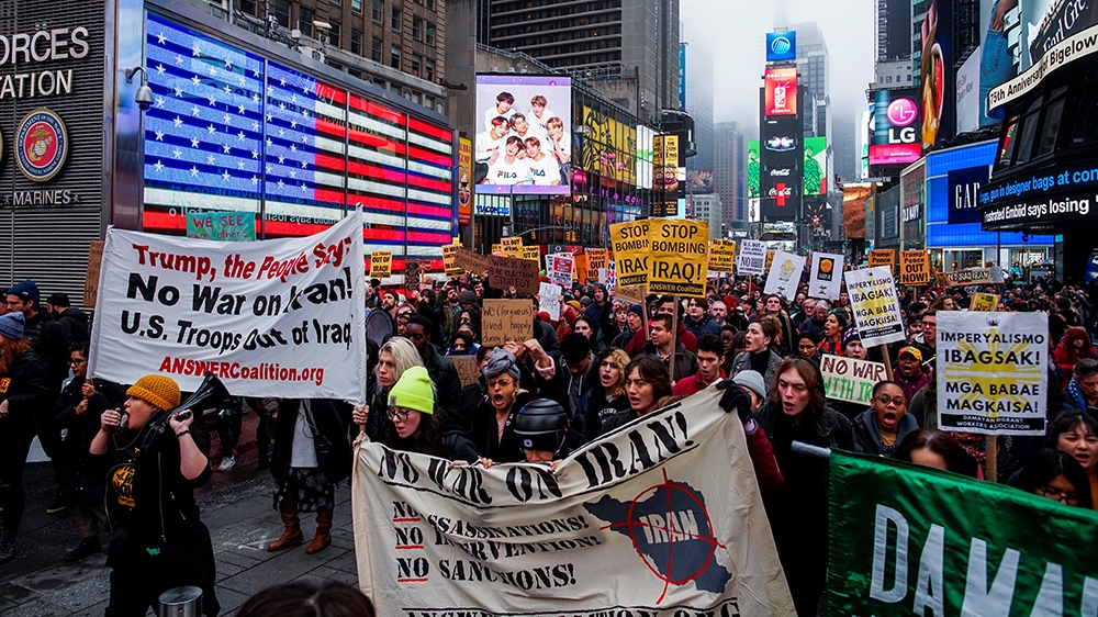 People march as they take part in an anti-war protest amid increased tensions between the United States and Iran at Times Square in New York, U.S., January 4, 2020. REUTERS/Eduardo Munoz