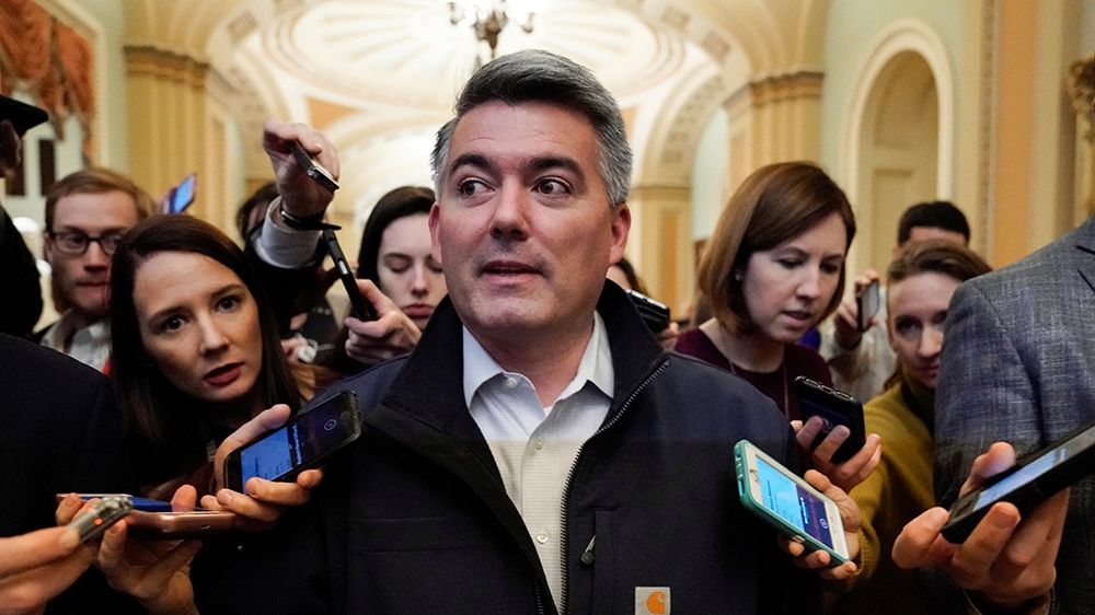 Senator Cory Gardner (R-C) arrives for a Republican caucus meeting before U.S. President Donald Trump announced a deal to end the partial government shutdown on Capitol Hill in Washington, U.S., Janua