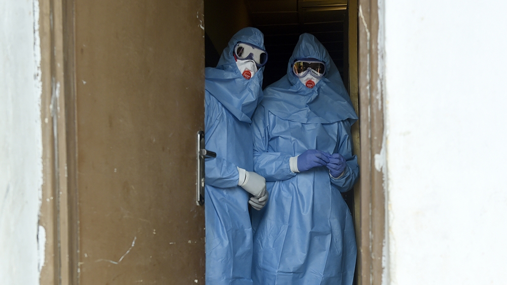 Health officials wear protective gear to tend to Lassa fever patients at the Institute of Lassa Fever Research and Control in Irrua Specialist Teaching Hospital in Irrua, Edo State, midwest Nigeria,