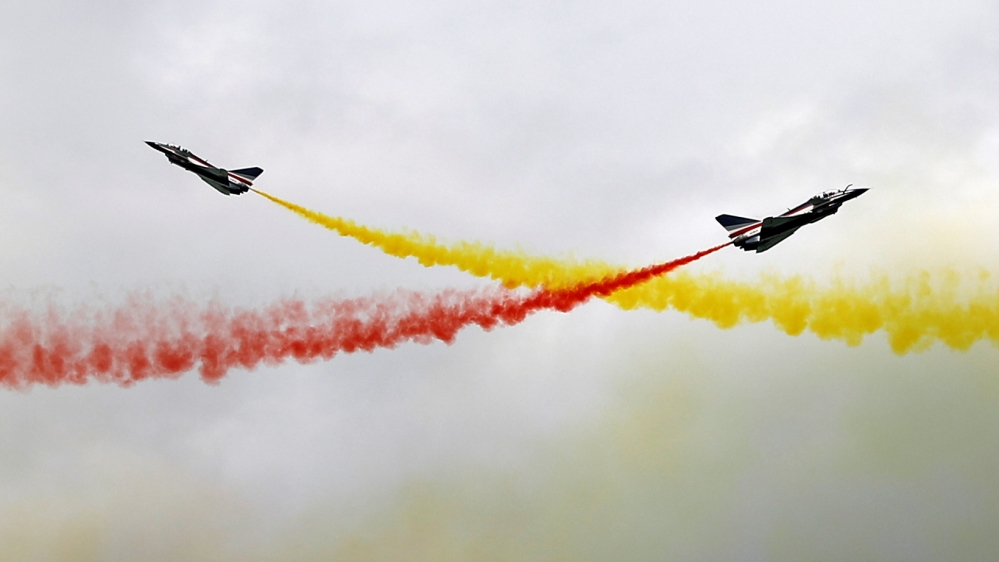 People''s Liberation Army Air Force (PLAAF) Ba Yi aerobatics team perform an aerial display at the Singapore Airshow in Singapore
