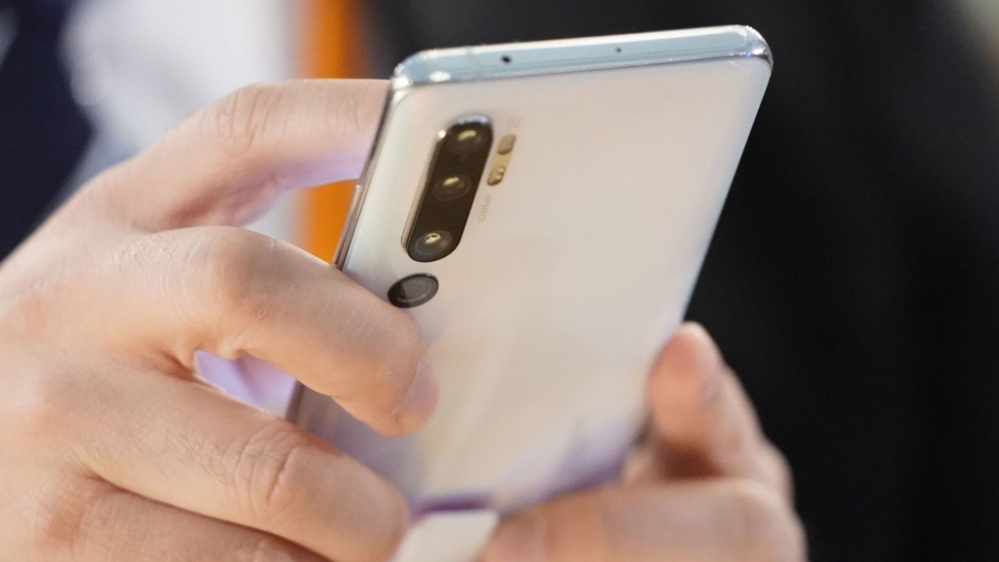 Xiaomi Takes on IPhone in Japan With Big Battery and Megapixels