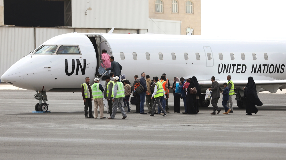 People board a United Nations plane which will carry them to Amman, Jordan in the first flight of a medical air bridge from Sanaa airport in Sanaa, Yemen February 3, 2020. REUTERS/Khaled Abdullah