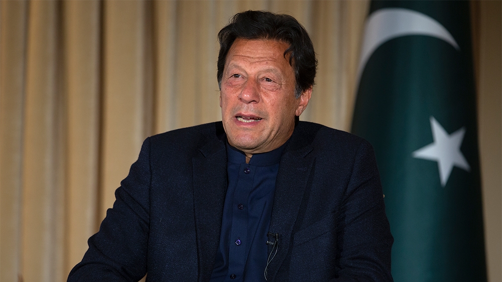 Pakistan's Prime Minister Imran Khan speaks to The Associated Press, in Islamabad, Pakistan, Monday, March 16, 2020. Khan said Monday he fears the new coronavirus will devastate developing nations' ec