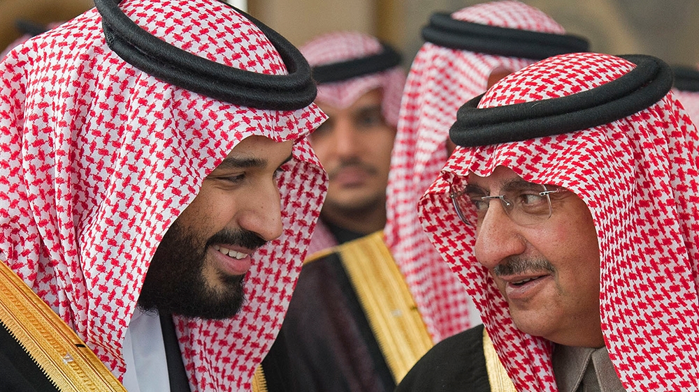(FILES) This file handout picture release by Saudi Royal Palace on December 14, 2016 shows Saudi Crown Prince Mohammed bin Nayef (R) speaking with deputy Crown Prince Mohammed bin Salman during the op