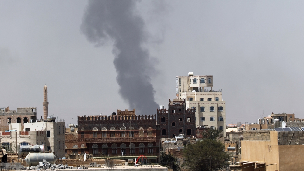Smoke billows from the site of a Saudi-led air strike in Sanaa