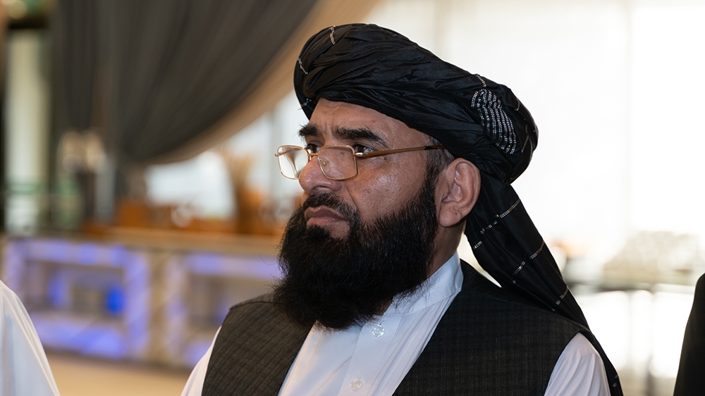 Suhail Shaheen, spokesperson for the Taliban political office, arrives at the US - Taliban deal signing ceremony in Doha, Qatar [Sorin Furcoi/Al Jazeera]
