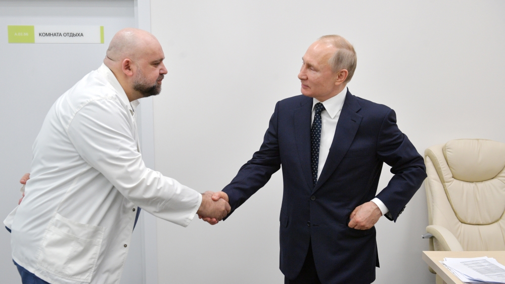 Russian President Putin visits a hospital for patients infected with coronavirus disease (COVID-19) on the outskirts of Moscow