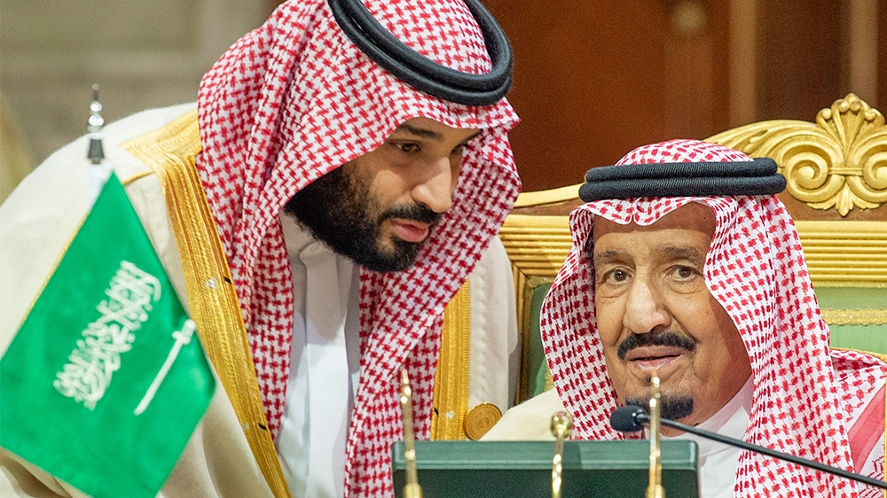 A handout picture provided by the Saudi Press Agency (SPA) on December 9, 2018, shows Saudi Crown Prince Mohammed bin Salman (L) speaking with Saudi Arabia''s King Salman bin Abdulaziz at the Diriya Pa