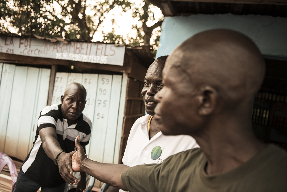 Marc Sandoumbé and his bodyguard are walking through the Fatima district. Marc Sandoumbé is not just the Chief District of Fatima, but also the man who judges witchcraft cases in the capital. Nowdays,