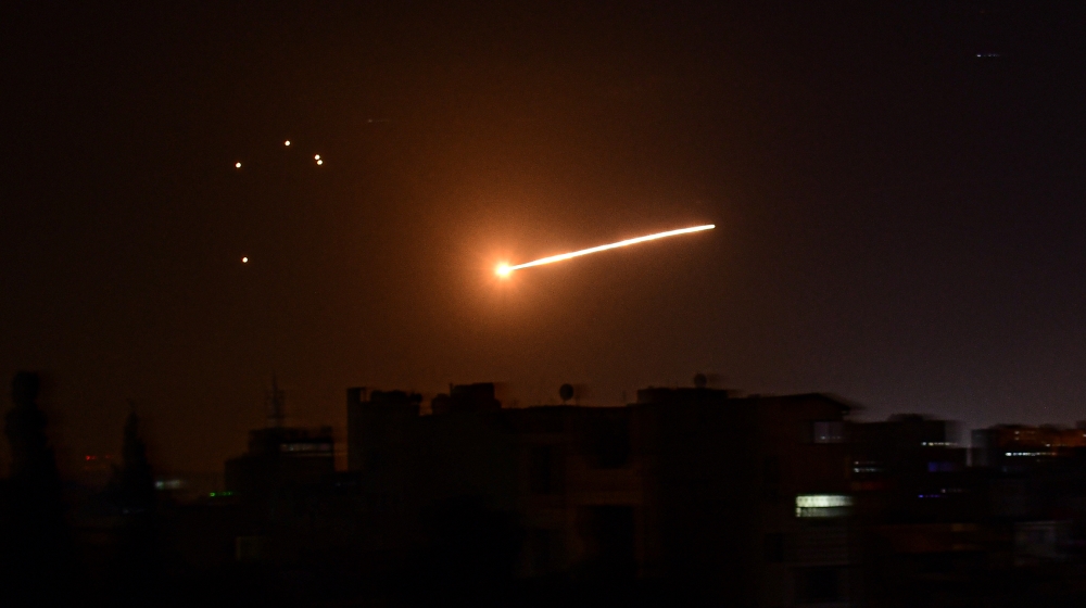 A handout picture released by the official Syrian Arab News Agency (SANA) on February 24, 2020, reportedly shows Syrian air defence intercepting an Israeli missile in the sky over the Syrian capital D