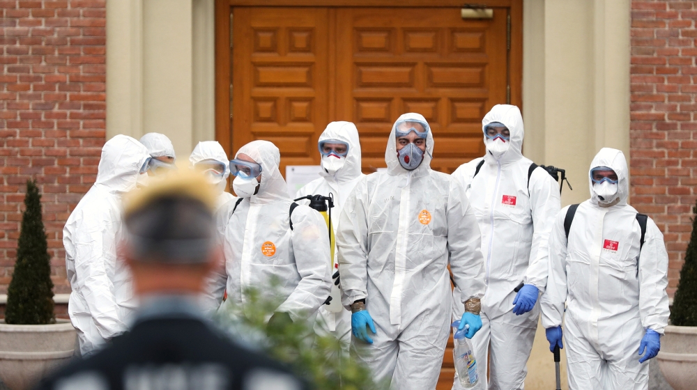 Members of the Military Emergency Unit (UME) leave an elderly home after carrying out disinfection procedures during the coronavirus disease (COVID-19) outbreak in Madrid, Spain March 23, 2020. REUTER