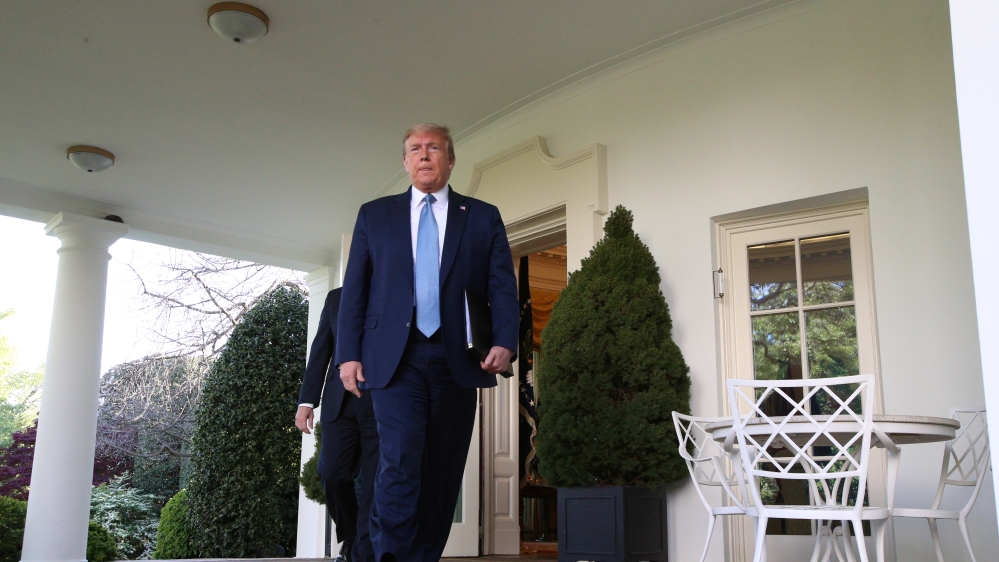 U.S. President Trump heads out of the Oval Office to hold the daily coronavirus outbreak task force briefing in Washington