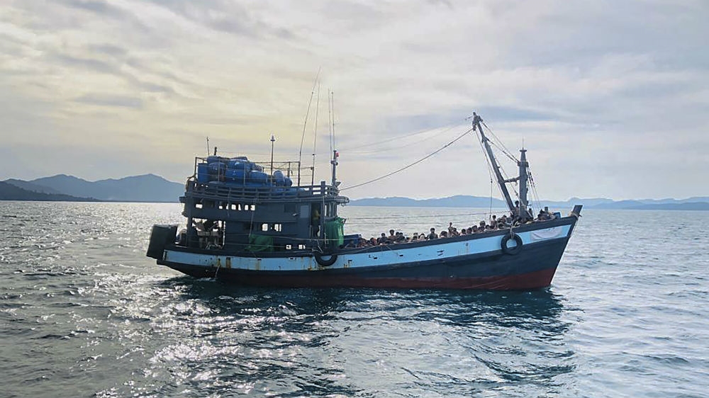 A wooden boat carrying suspected Rohingya migrants detained in Malaysian territorial waters.
