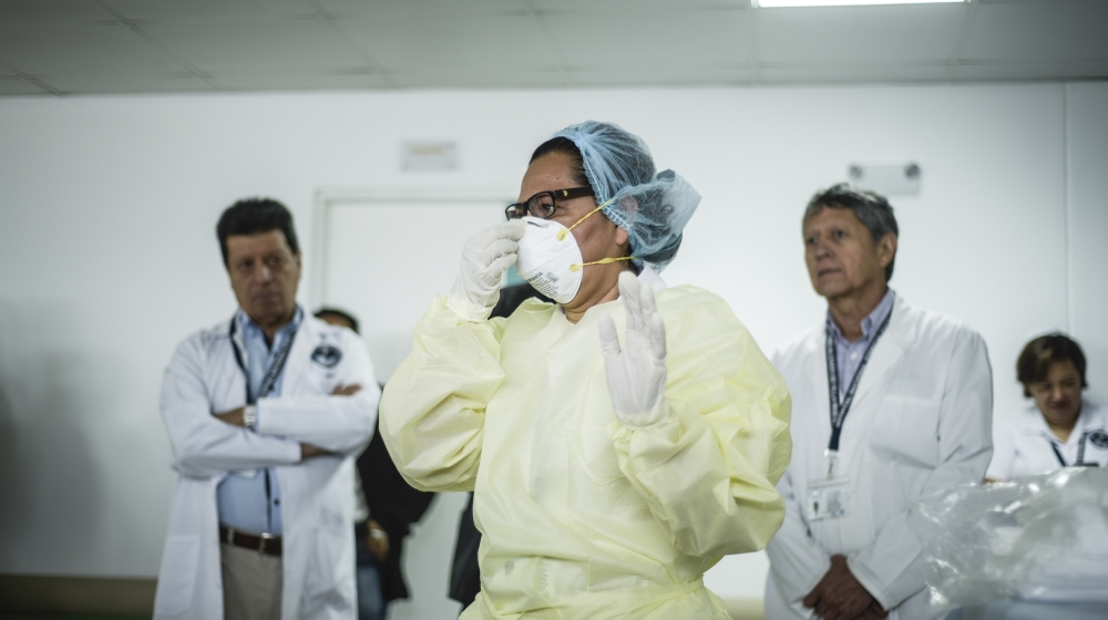 Coronavirus precautions in Guatemala- - VILLA NUEVA, GUATEMALA - MARCH 07: A nurse shows the process of how to protect themselves from coronavirus at the National Hospital, where patients carrying the