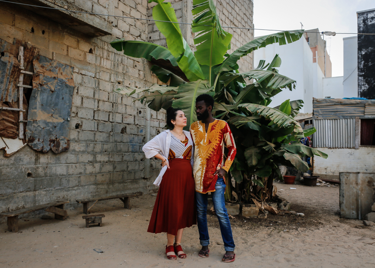 Despite concerns about a potential outbreak in Senegal, a French-Senegalese couple that is 5-months pregnant with their first child is forced to stay behind in Dakar due to a myriad of African and Eur