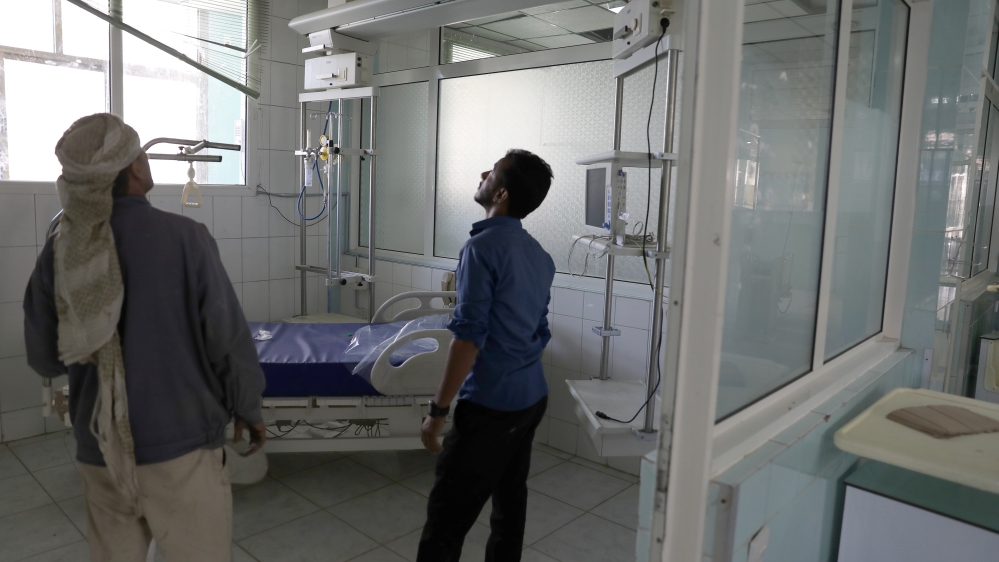 Workers inspect an intensive care room for renovation at a hospital allocated for coronavirus patients in preparation for any possible spread of the coronavirus disease (COVID-19), in Sanaa