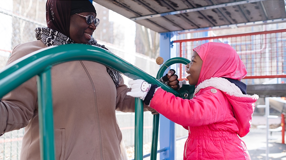 Still Here - Elaine and daughter in park [Sara Bennett/Al Jazeera]