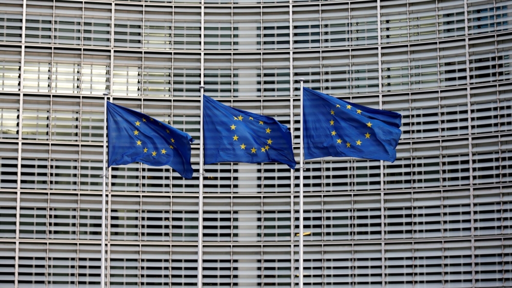 European Union flags flutter outside the EU Commission