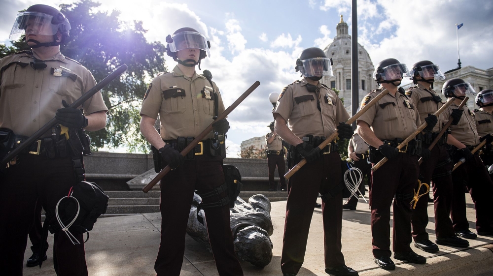 Members of the Minnesota State Patrol stand guar