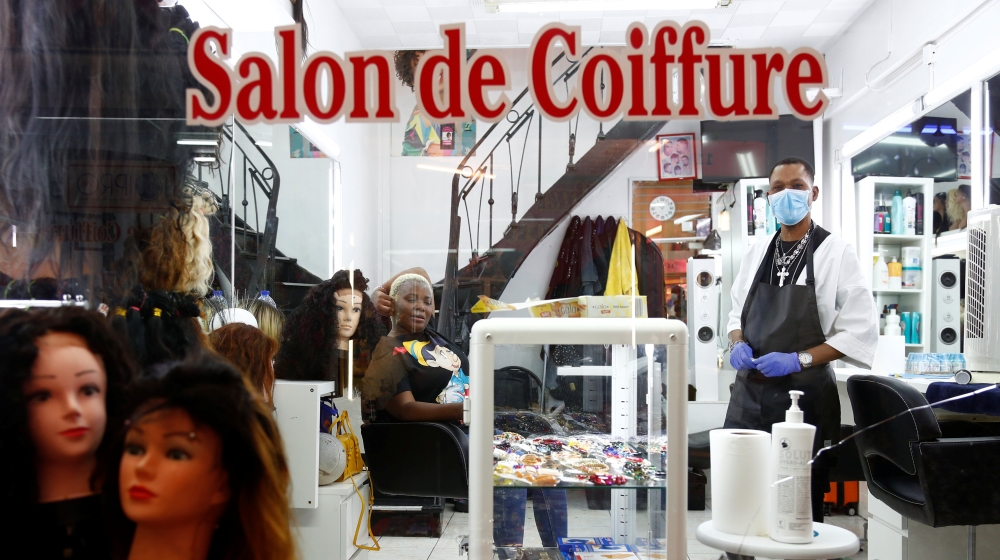 Hairdresser Nicky Chou poses in her hair salon at the Matonge gallery in Brussels