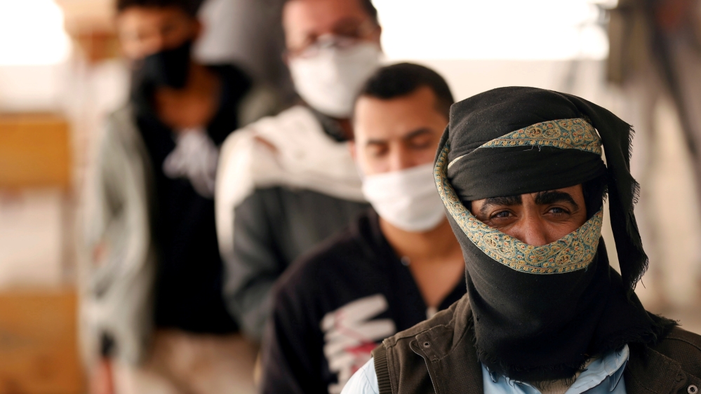 people stand in line sanaa yemen sana''a