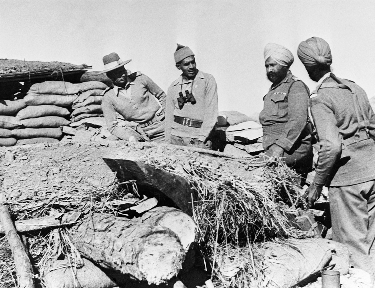 Indian officers occupying a fort on the Ladakh border during the war between India and China, 1962. (Photo by © Hulton-Deutsch Collection/CORBIS/Corbis via Getty Images)