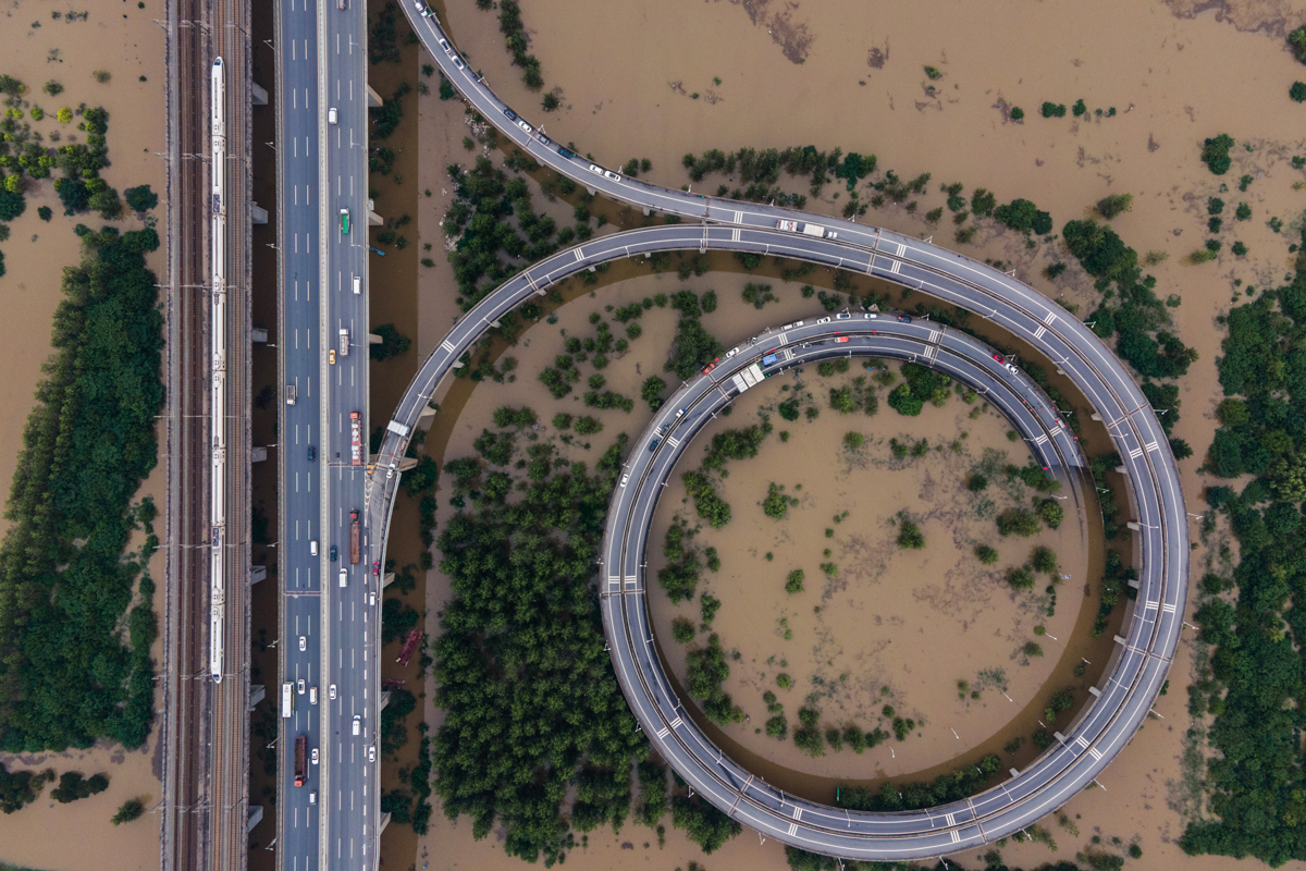 This aerial view shows a bridge leading to the inundated Tianxingzhou island, which is set to be a flood flowing zone to relieve pressure from the high level of water in Yangtze River, in Wuhan in Chi