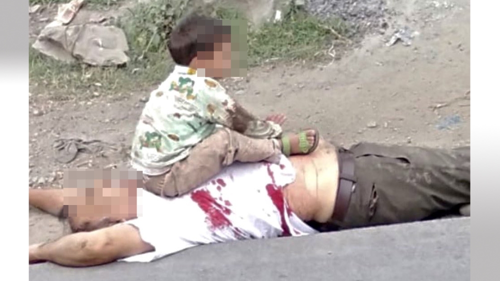 Dead body of civilian lies on the ground