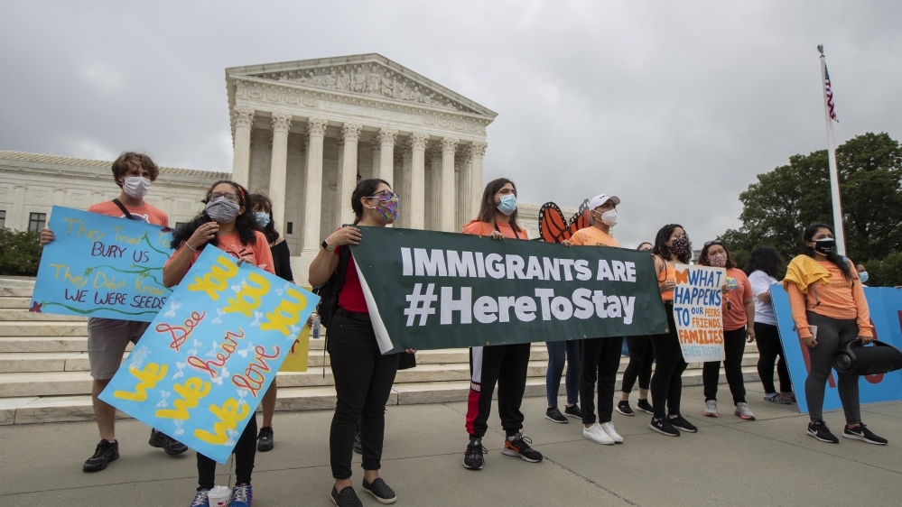 (DACA) students celebrate in front of the Supreme Court a