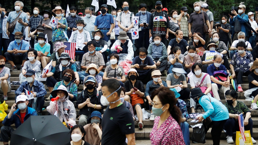 Members of conservative civic groups take part in an anti-government protest, as concerns over a fresh wave of the coronavirus disease (COVID-19) cases grow, in central Seoul, South Korea, August 15,