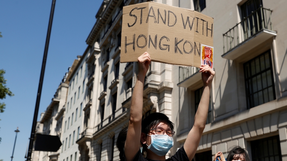 Pro-democracy demonstrators protest Hong Kong''s deteriorating freedoms outside China''s embassy, in London