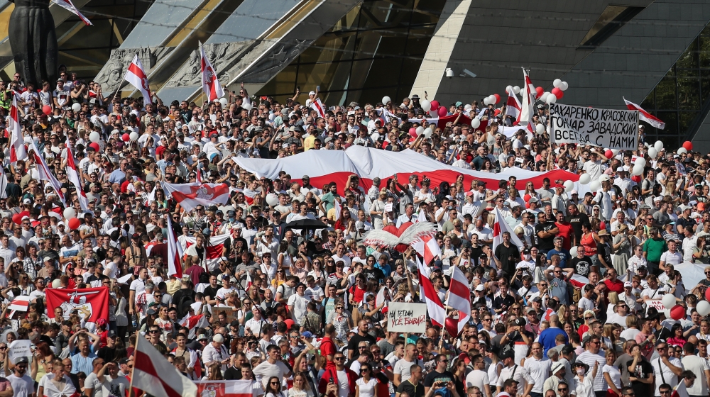 Thousands of people attend a rally in support of the Belarusian Opposition to demonstrate against police brutality and the presidential election results, in Minsk, Belarus, 16 August 2020. Long-time P
