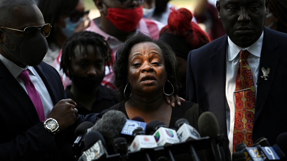 People protest after a Black man identified as Jacob Blake was shot several times by police in Kenosha