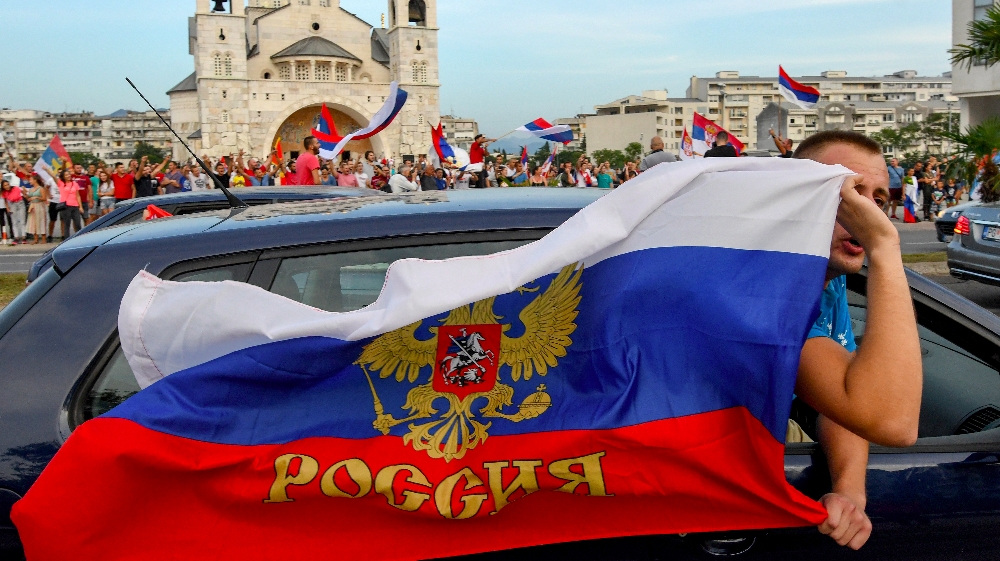 Opposition supporters celebrate on the streets after the general elections in Podgorica, Montenegro, on August 31, 2020. Montenegro's pro-West ruling party could be knocked from power