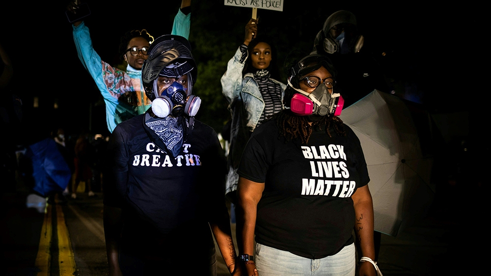 Protesters march for the sixth consecutive night of protest on September 7, 2020, following the release of video evidence that shows the death of Daniel Prude while in the custody of Rochester Police