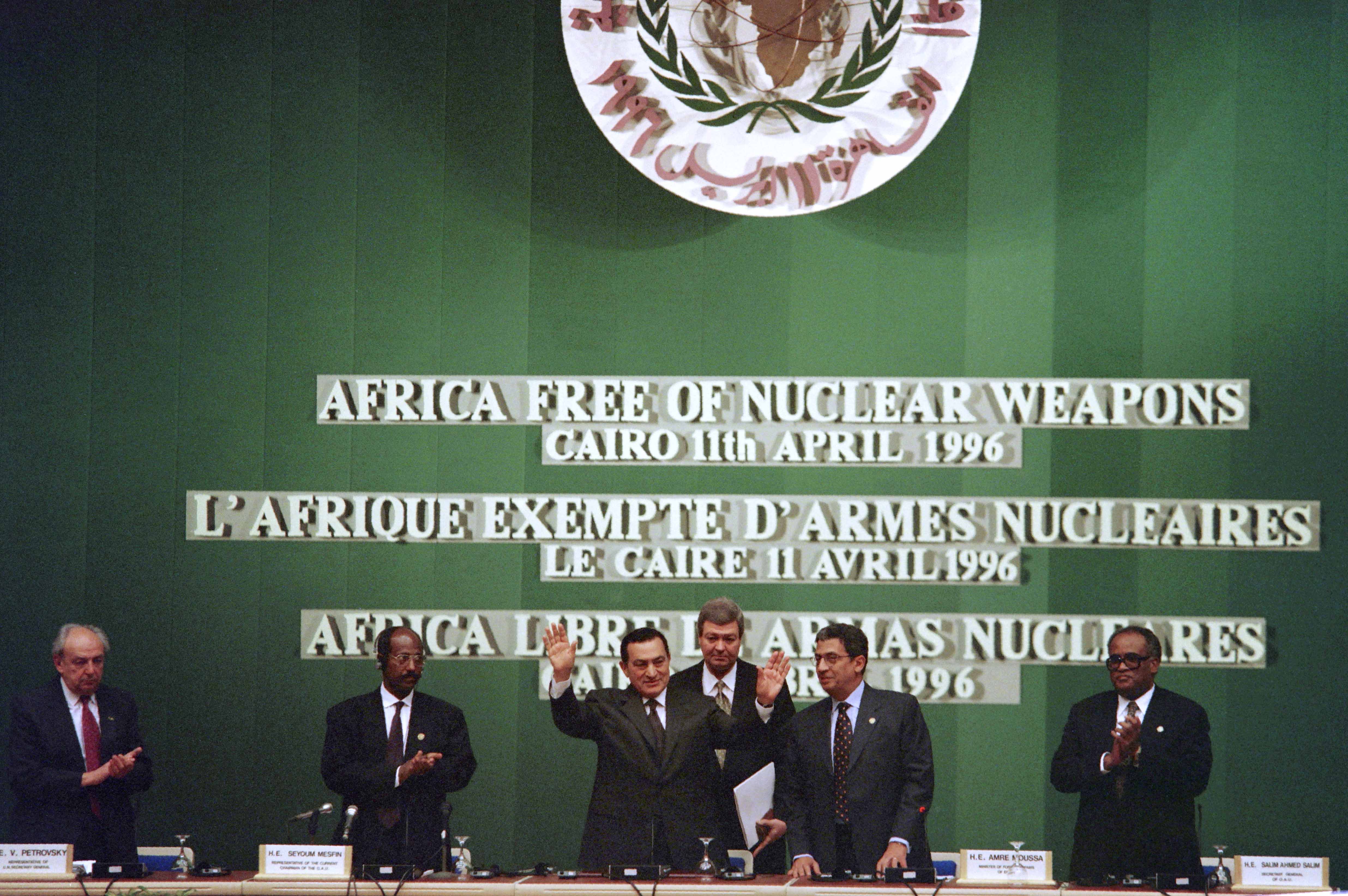 Egyptian President Hosni Mubarak waves at African delegates at the beginning of the signing of a landmark document, named Pelindaba Treaty, declaring Africa a nuclear-free zone on April 11, 1996 in Cairo [Amr Nabil/AFP]