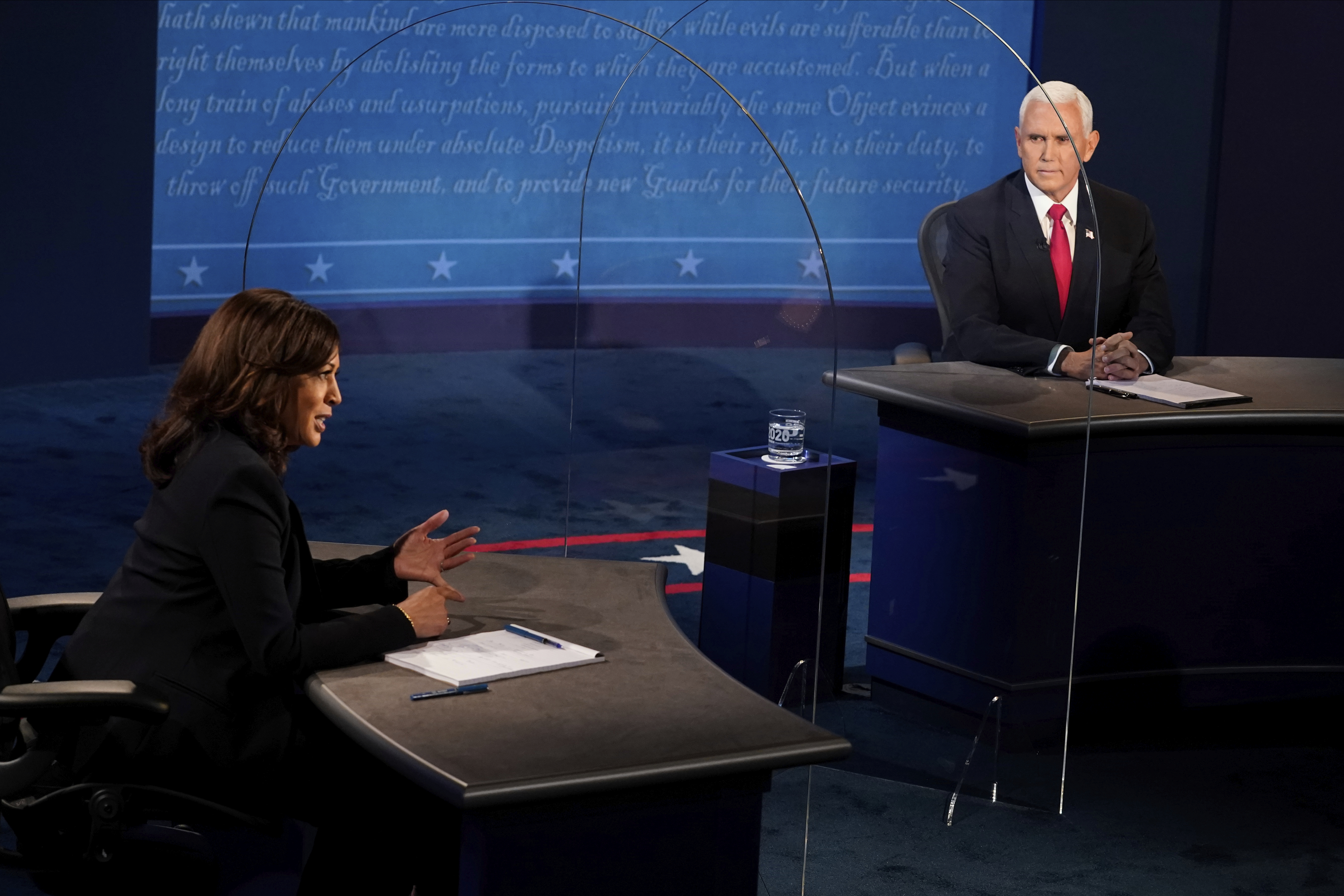 Senator Kamala Harris and Vice President Mike Pence during the vice presidential debate , D-Calif., as she answers a question during the vice presidential debate [AP Photo/Morry Gash, Pool]